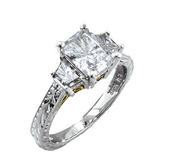 Platinum Radiant Cut Diamond With Tapered Baguette Side Stones In Engraved Mounting